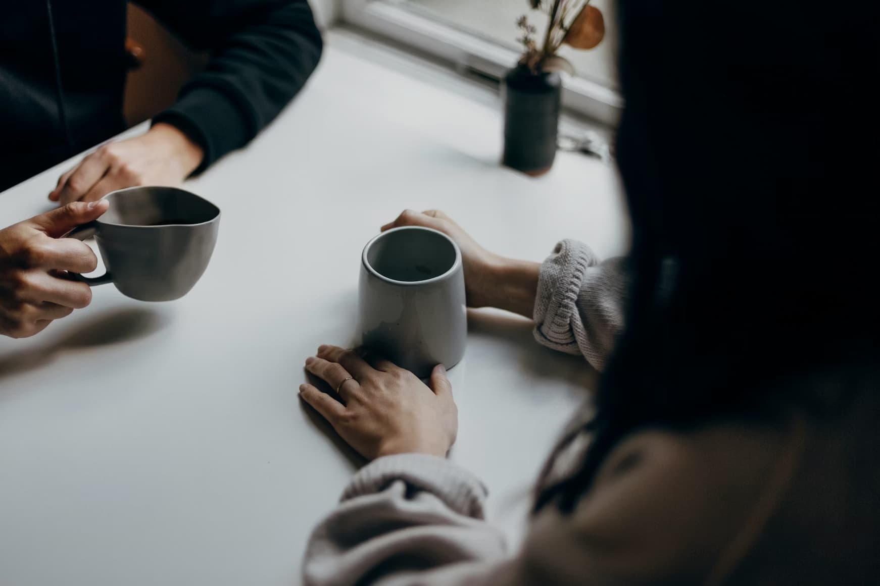 Two people in a quiet conversation
